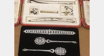 "Somewhere in the Rainbow" gem and mineral collection manager Shelly Sergent will lead a lecture on this Cartier bandeau tiara, seen in its original box above, at a jewelry conference this summer. 20190408_Conference_Header.jpg