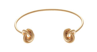 Pictured here is the “Forget Me Knot” open bangle from Olivia Burton. Despite flat sales in the second quarter, Movado revised its outlook for the full-year upward following the acquisition of the Olivia Burton jewelry brand. Right now, the brand is present in the U.S. through retailers like Anthropologie, Lord & Taylor and Nordstrom, according to its website. 20170829-Olivia-Burton.jpg