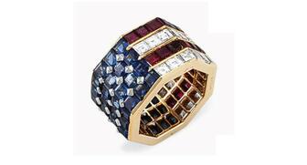 This Bulgari ring, set with square-cut sapphires, rubies and diamonds in an American flag motif, knocked its pre-sale high estimate of $8,000 out of the park when it garnered $319,500 at Christie’s this week. Nancy Reagan wore it on July 4, 1986, on board the USS Iowa for Liberty Weekend, celebrating the restoration and centenary of the Statue of Liberty. 20160923_Bulgari_ring.jpg