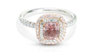 This ring from WPJ features a 1.01-carat fancy deep brownish-orange-pink diamond mounted in an 18-karat rose gold and platinum ring with a micro-pave double halo ($30,000). 20170403_WP-Header.jpg