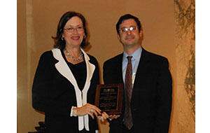 JVC CEO and President Cecilia Gardner, left, with Brad Brooks-Rubin, who received the Stanley Schechter Award at JVC’s annual luncheon Friday for his work while he was employed by the U.S. State Department. 011514_JVC-Article.jpg