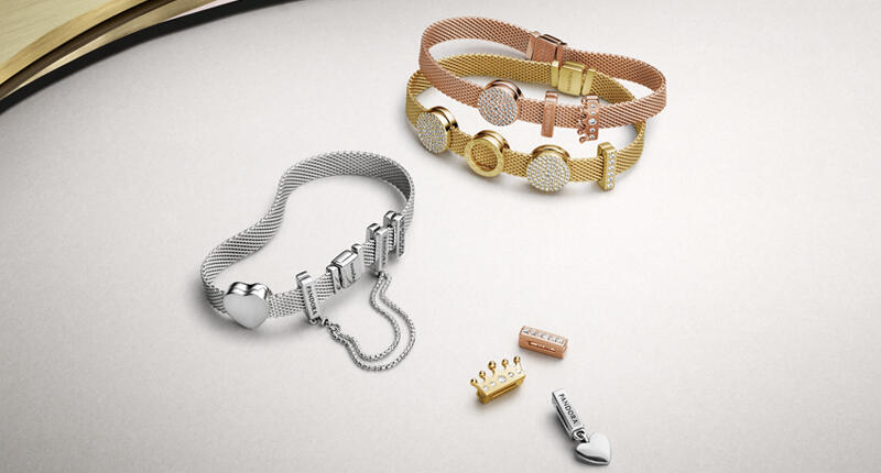 Pandora introduced “Reflexions” in October, a mesh-style collection that features its first new bracelet in five years. The company said Tuesday amid poor third quarter results that Reflexions “has been very well received by the consumers.” 20181008_Pandora.jpg