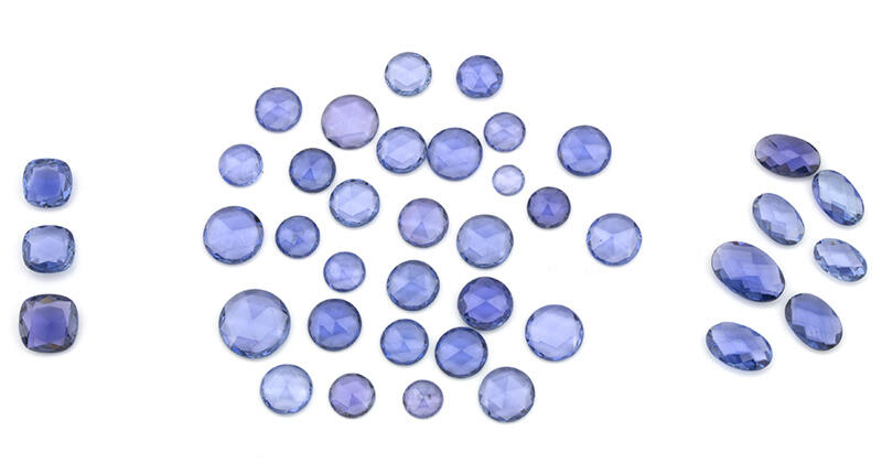 A selection of rose-cut and petal-cut Yogo sapphires from the Vortex mine 20190919_Yogo-3.jpg