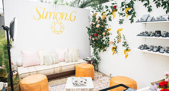 Simon G’s booth at South by Southwest included a Henna artist, snacks and a jewelry cleaning station, among other things. There also was some product, but it was positioned in a way that allowed visitors to find it on their own, the brand said. 20170412_Simon-G-SXSW.jpg