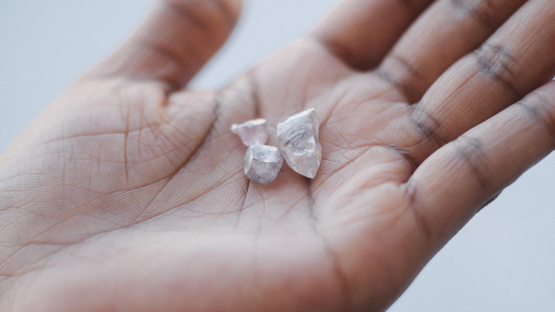 2021_Rough diamonds in hand De Beers.jpg