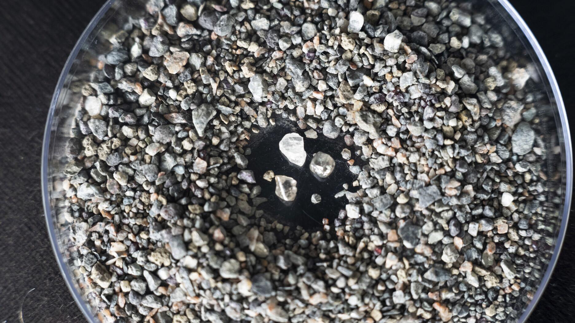 Stock image of rough diamonds from De Beers  