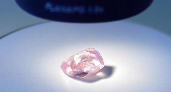 Alrosa provided this photograph of the 27.85-carat pink diamond just recovered by Almazy Anabara, a subsidiary of the Moscow-based mining company. If Alrosa opts to cut the stone and sell it polished, it could become the most expensive polished diamond in company history. 20170922_Alrosa-pink.jpg