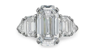 This is the platinum Raymond Yard diamond ring that David Rockefeller used to propose to his wife Peggy in 1940. It sold for $$287,500 at auction Tuesday. 20180613_Raymond-Yard.jpg