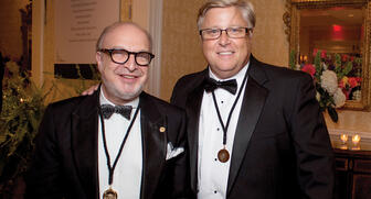 The two new members of the 24 Karat Club Southeastern United States, inducted at its annual banquet Aug. 6, are Michael Lebowitz, director of jewelry at White Pine Trading (at left) and Stark Harbour, owner of Southern Jewelry Insurance. 20160823_24-Karat-Club-SE.jpg