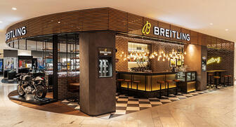 The new Breitling boutique in the Jelmoli department store in Zurich, Switzerland, offers shoppers wine, coffee and food as well as a look at its watch selection. 20190520_Breitling-bistro-bar-header.jpg