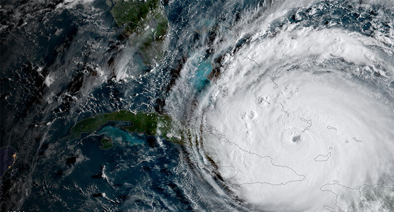 A September 2017 satellite view of Hurricane Irma, which reached maximum sustained winds of 185 miles per hour at its peak. Jewelers Mutual suggests retailers install impact-resistant window systems to protect against strong winds. (Image credit: NOAA) 20190620_Hurricane_Irma.jpg