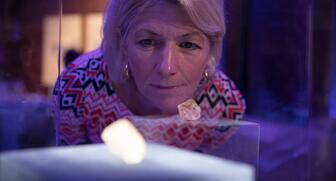 The Foxfire Diamond, pictured here in the display case it will occupy for another month in Washington, D.C., is the largest known rough gem-quality diamond ever mined in North America. It was found at the Diavik Diamond Mine in Canada in August 2015. (Photo credit: Clay Blackmore) 20170119_Diavik-in-case.jpg