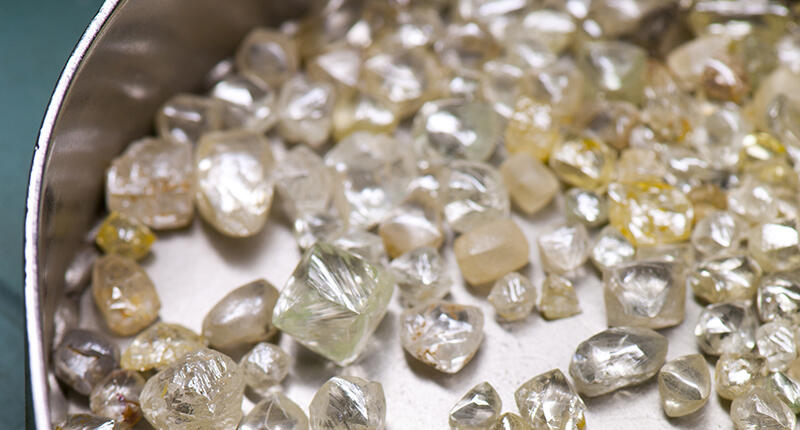 A variety of colored diamonds of “a good quality and comparatively high value” recovered by De Beers (Namdeb) off the coast of Namibia. The company sold less rough by volume but for a higher average realized price in 2018. (Image © PMP/ De Beers 2011) 2019_De_Beers_colored_rough.jpg