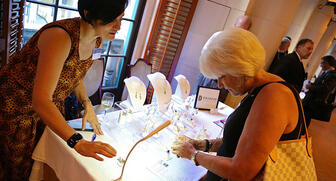 Jewelers of America held its third annual “Wear One” event last Saturday at the Yale Club in New York City, bringing its retail and supplier members together for a cocktail party complete with jewels. This is Elena Drukker of Drukker Designs with Ronda Daily of Bremer Jewelry in Illinois. (Photo credit: David Stewart Brown Photography) 20160729_Wear-One-article.jpg