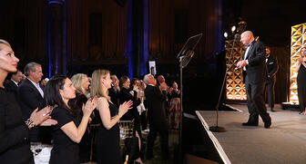 Stewart Wicht, who just retired as head of the U.S. market for Rolex, received a standing ovation as he took the stage to accept the 2019 Gem Award for Lifetime Achievement. (Photo credit: Benjamin Lozovsky/BFA.com) 20190115_Gem_header_Wicht.jpg