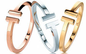 Tiffany has had success with its new “T” collection in karat gold. The bracelets pictured here are, from left, 18-karat rose, white and yellow gold and retail for $5,000 each. Photo credit: Tiffany&Co. 112614_Tiffany-T-article.jpg