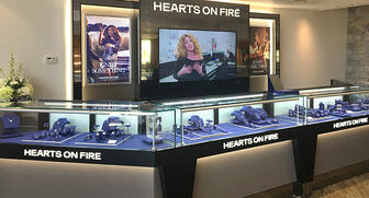 Hearts On Fire has named Chicago-based James & Sons as its Retailer of the Year, recognizing the retailer for increased inventory, brand training for staff and the installation of new HOF brand boutiques in all of their stores as seen here. 20161228_James-and-Sons.jpg