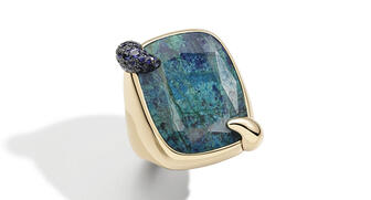 Kering plans to control e-commerce for all its brands by the first half of 2020. The company owns a dozen luxury brands in fashion, leather goods, watches and jewelry, including Pomellato, Boucheron, Girard-Perregaux and Ulysse Nardin. A chrysocolla ring from the Pomellato 50th anniversary collection is pictured above. 3-20171005_Chrysocolla.jpg
