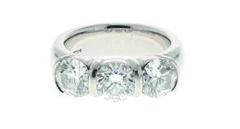 This Tiffany ring featuring three round brilliant-cut diamonds set in platinum is one of the lots in the upcoming U.S. Marshals auction. 20180802_Tiffany-ring.jpg