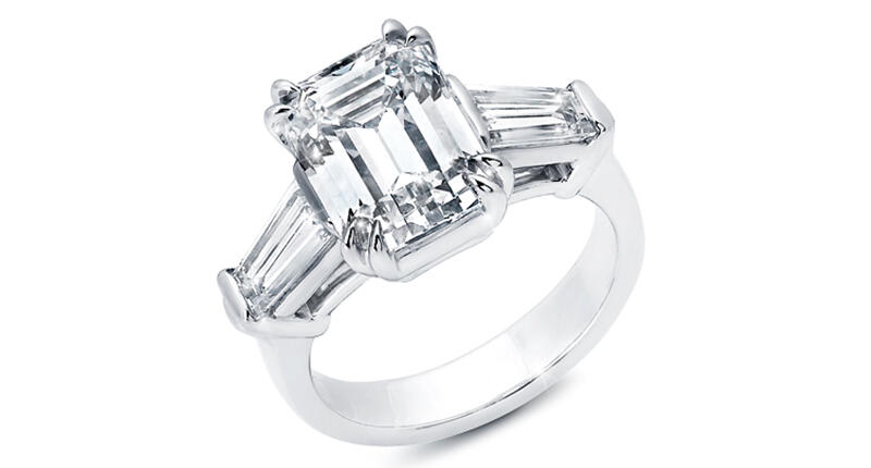 Seen here is a platinum ring from Berj Kouyoumjian Jewelry featuring a 5.16-carat emerald-cut diamond at center and two diamond baguettes weighing 1.36 carats. 20170526_Platinum-BerjK.jpg