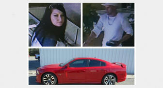 These photos supplied by the Jewelers’ Security Alliance show the man and woman wanted in a triple homicide at a jewelry store and pawn shop in Jackson, Mississippi on Saturday. The photo at bottom is of a 2013 red Dodge Charger SRT, the type of vehicle involved in the case. 20161221_triple-homicide.jpg