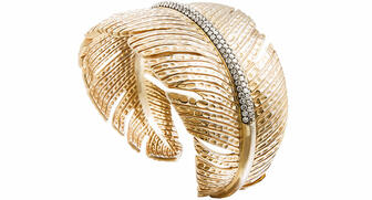 The Feather cuff from Michael Aram in 18-karat gold with 2.66 carats of white diamonds ($16,900 retail). Michael Aram will be handling the manufacturing, distribution and branding of its jewelry beginning Feb. 1. 20170118_Michael-Aram-cuff.jpg